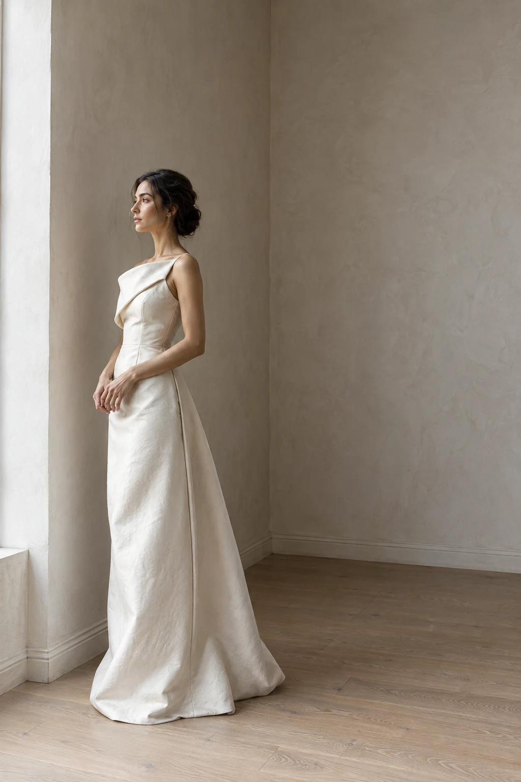 Fashion inspiration: woman in a sculptural dress in a bright interior